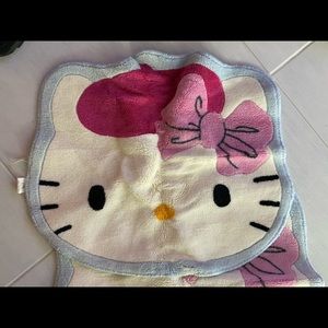 Hello Kitty bathroom floor mats, 3 the same, 1 different